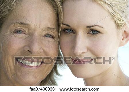 Mother with adult daughter, portrait View Large Photo Image Stock Image - Mother with adult daughter, portrait. Fotosearch