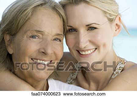 Mother with adult daughter, portrait View Large Photo Image Stock Image - Mother with adult daughter, portrait. Fotosearch