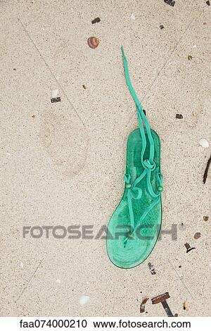 Sandal left on beach View Large Photo Image Stock Image - Sandal left on beach. Fotosearch