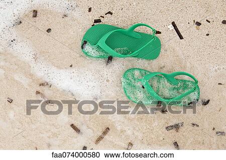 Sandals left on beach View Large Photo Image Stock Image - Sandals left on beach. Fotosearch
