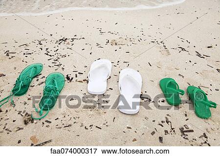 Sandals left on beach View Large Photo Image Stock Photo - Sandals left on beach. Fotosearch