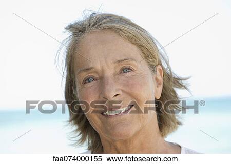 Stock Photography - Senior woman smiling, portrait. Fotosearch
