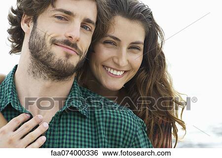 Smiling young couple, portrait View Large Photo Image Stock Photograph - Smiling young couple, portrait. Fotosearch
