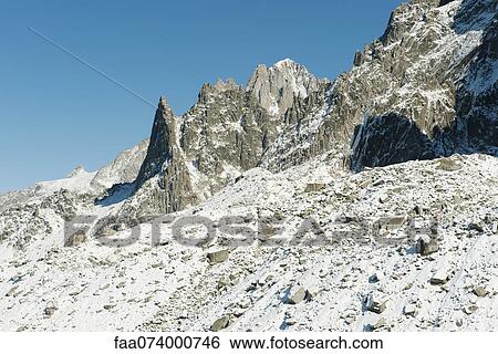 Stock Photograph - Snow-covered mountains. Fotosearch
