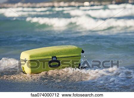 Suitcase on beach View Large Photo Image Stock Image - Suitcase on beach. Fotosearch