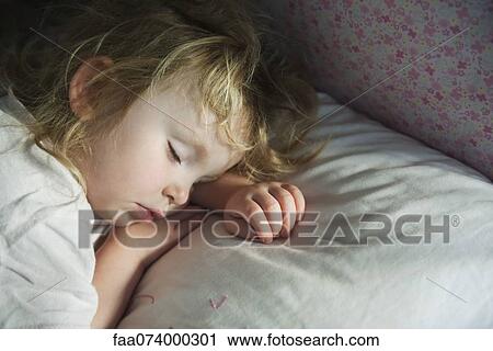 Stock Image - Toddler napping. Fotosearch