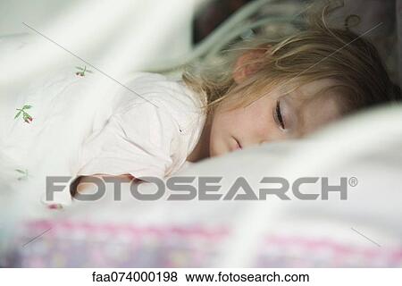 Toddler sleeping, obscured face View Large Photo Image Stock Photo - Toddler sleeping, obscured face. Fotosearch