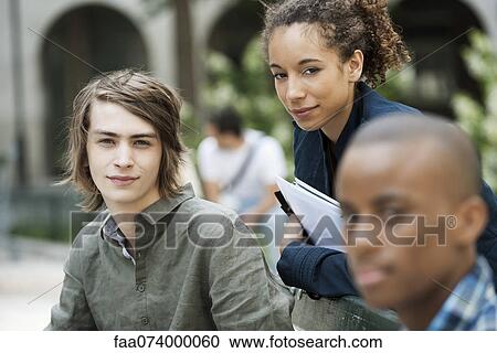 Stock Image - University students on campus. Fotosearch