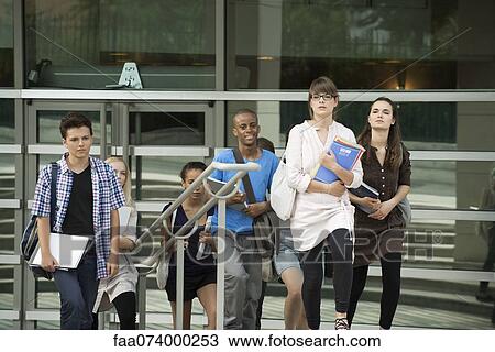 Stock Image - University students walking. Fotosearch