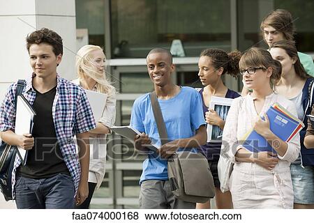 University students walking together View Large Photo Image Stock Photo - University students walking together. Fotosearch
