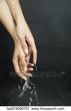 Stock Photo - Washing hands. Fotosearch