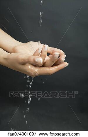 Stock Photo - Washing hands. Fotosearch