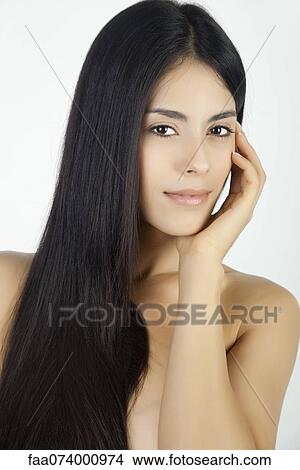 Woman with hand under chin, portrait View Large Photo Image Picture - Woman with hand under chin, portrait. Fotosearch