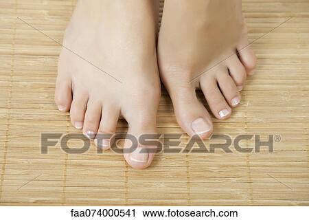 Woman's bare feet View Large Photo Image Stock Image - Woman's bare feet. Fotosearch