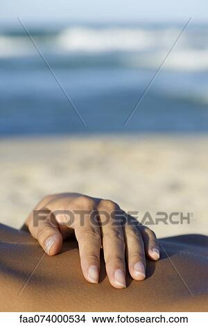 Woman's hand on abdomen View Large Photo Image Picture - Woman's hand on abdomen. Fotosearch