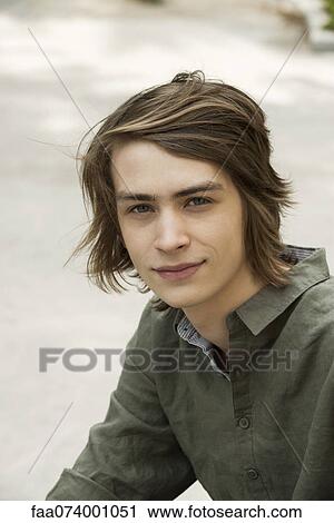 Stock Image - Young man, portrait. Fotosearch