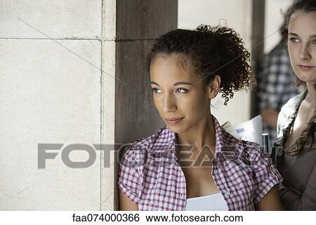 Young woman in thought View Large Photo Image Stock Photograph - Young woman in thought. Fotosearch