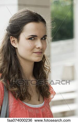 Stock Photograph - Young woman, portrait. Fotosearch