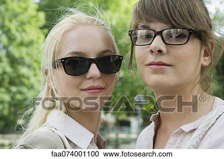 Stock Image - Young women, portrait. Fotosearch