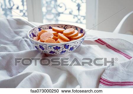 Bowl of carrot slices View Large Photo Image Stock Image - Bowl of carrot slices. Fotosearch