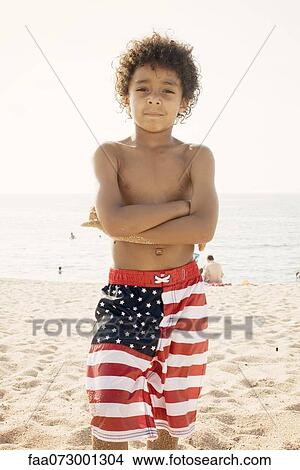 Boy at the beach, portrait View Large Photo Image Picture - Boy at the beach, portrait. Fotosearch