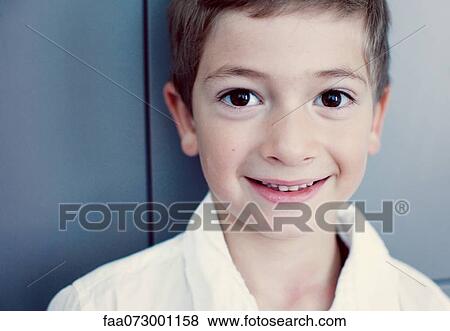 Boy smiling at camera, portrait View Large Photo Image Stock Photo - Boy smiling at camera, portrait. Fotosearch