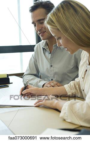 Businesswoman signing contract View Large Photo Image Stock Image - Businesswoman signing contract. Fotosearch