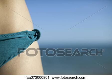 Close-up of woman's hip and bikini bottom View Large Photo Image Stock Image - Close-up of woman's hip and bikini bottom. Fotosearch