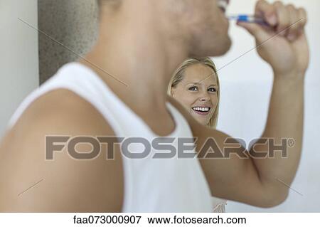 Couple together in bathroom View Large Photo Image Stock Photo - Couple together in bathroom. Fotosearch