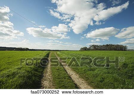 Dirt road through countryside, Guilliers, Brittany, France View Large Photo Image Stock Image - Dirt road through countryside, Guilliers, Brittany, France. Fotosearch