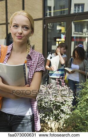 Female college student outdoors View Large Photo Image Stock Image - Female college student outdoors. Fotosearch