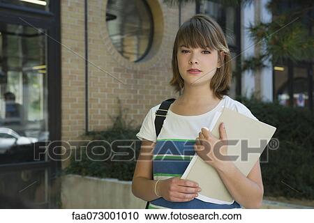 Stock Image - Female college student, portrait. Fotosearch