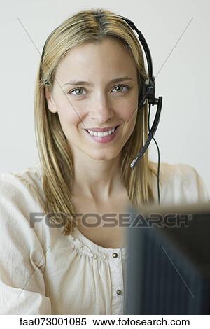 Female telemarketer, portrait View Large Photo Image Stock Photography - Female telemarketer, portrait. Fotosearch