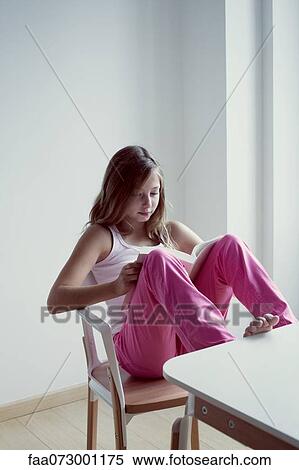 Stock Photography - Girl reading book. Fotosearch