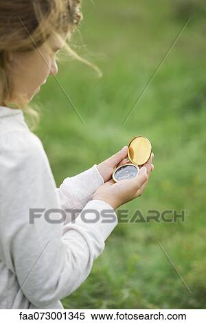Girl using compass View Large Photo Image Stock Photography - Girl using compass. Fotosearch