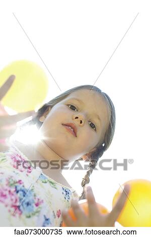 Girl with pigtails, directly below view View Large Photo Image Stock Photography - Girl with pigtails, directly below view. Fotosearch