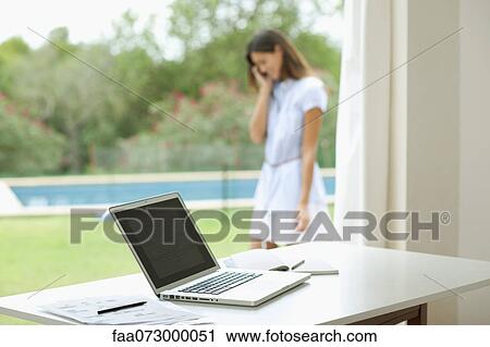 Laptop computer on desk View Large Photo Image Stock Image - Laptop computer on desk. Fotosearch