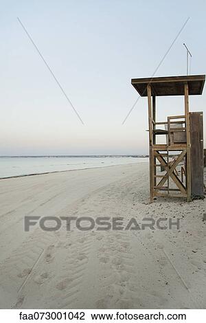 Lifeguard stand on deserted beach View Large Photo Image Stock Image - Lifeguard stand on deserted beach. Fotosearch
