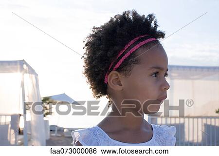 Little girl looking away, portrait View Large Photo Image Stock Photograph - Little girl looking away, portrait. Fotosearch