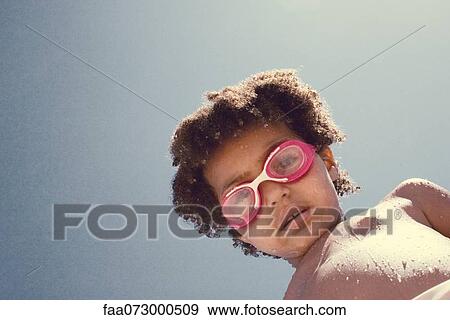 Little girl wearing swim goggles, portrait View Large Photo Image Stock Photo - Little girl wearing swim goggles, portrait. Fotosearch