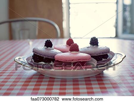 Macaroons with berries View Large Photo Image Stock Image - Macaroons with berries. Fotosearch