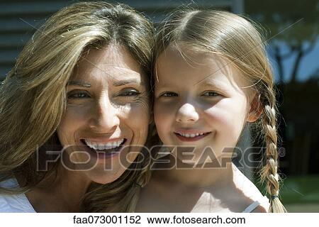 Mother and daughter, portrait View Large Photo Image Stock Image - Mother and daughter, portrait. Fotosearch