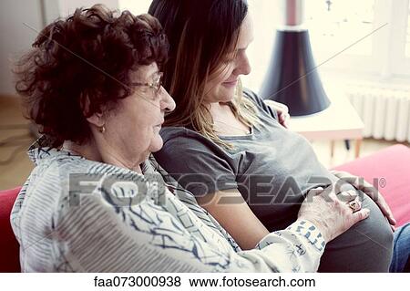 Mother and pregnant daughter View Large Photo Image Stock Photo - Mother and pregnant daughter. Fotosearch