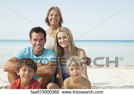Multi-generation family at the beach, portrait View Large Photo Image Stock Image - Multi-generation family at the beach, portrait. Fotosearch