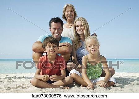 Multi-generation family at the beach, portrait View Large Photo Image Stock Photograph - Multi-generation family at the beach, portrait. Fotosearch