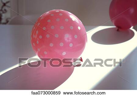 Pink ballon with polka dots View Large Photo Image Stock Photo - Pink ballon with polka dots. Fotosearch