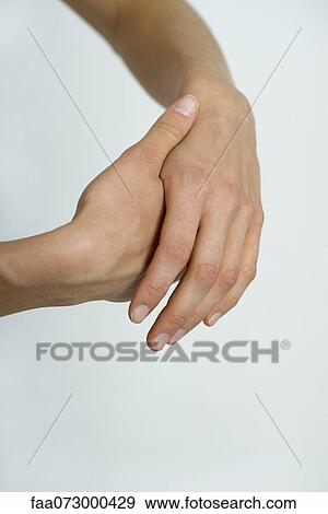 Rubbing hands, cropped View Large Photo Image Stock Photo - Rubbing hands, cropped. Fotosearch