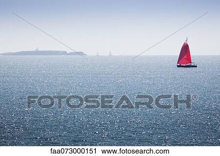 Sailboat off the coast of Belle-Ile-en-Mer, Morbihan, Brittany, France View Large Photo Image Stock Image - Sailboat off the coast of Belle-Ile-en-Mer, Morbihan, Brittany, France. Fotosearch
