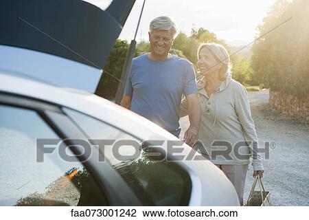 Senior couple loading car View Large Photo Image Stock Image - Senior couple loading car. Fotosearch