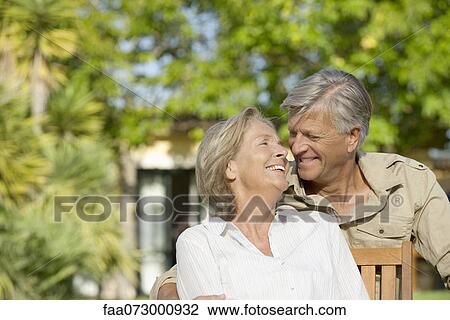 Senior couple spending time together outdoors View Large Photo Image Stock Image - Senior couple spending time together outdoors. Fotosearch